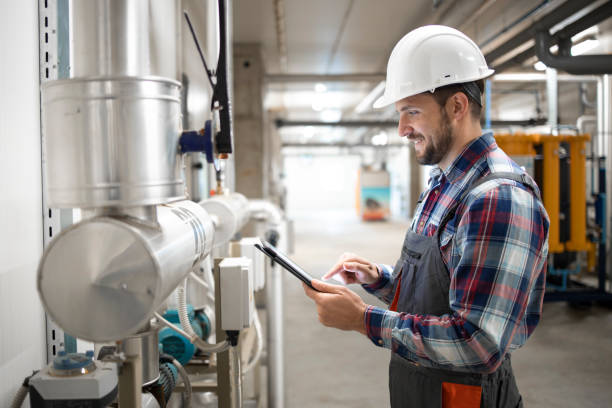 Inspector at storage tank